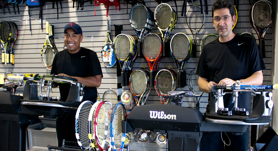 Stringing racquets at our local Doral store