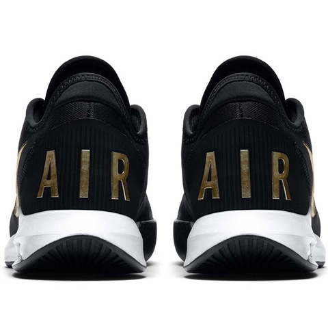 black and gold tennis shoes