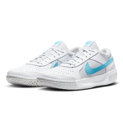 white and blue nike tennis shoes